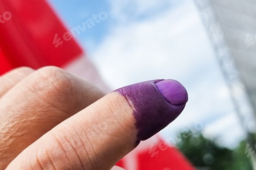 Preview: Closeup of purple indelible ink on index finger. Used in election in Malaysia to prevent fraud.