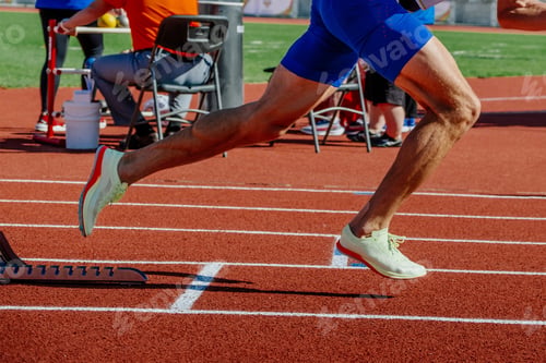 Preview: legs male athlete start running in starting blocks sprint race, summer athletics championships