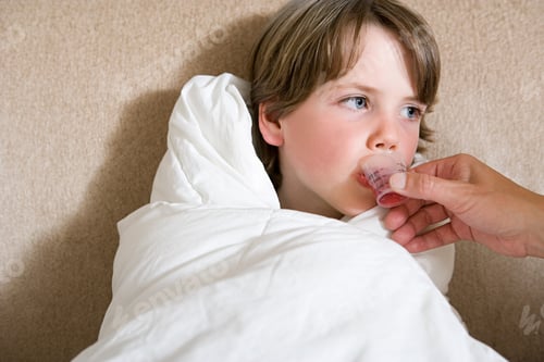Preview: Boy being given medicine