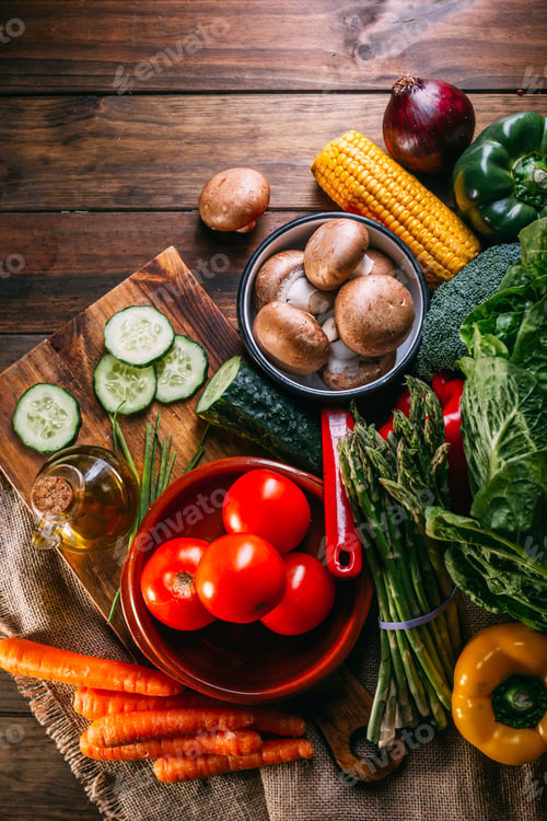 Preview: Vegetables and utensils on kitchen table