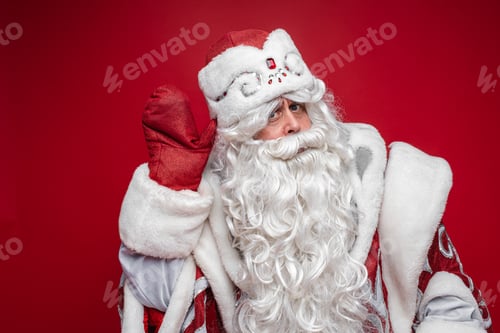 Preview: Santa with hand by ear listening carefully.