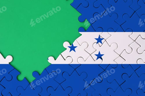 Preview: Honduras flag is depicted on a completed jigsaw puzzle with free green copy space on the left side.