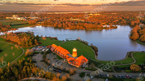 Preview: Aerial view of Caldecotte lake and its surroundings on a beautiful autumn evening