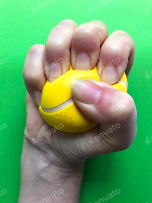 Preview: Stress Relief. : Stress ball in a clenched fist