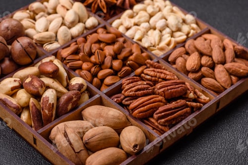 Preview: Box with various nuts cashew, macadamia, peanut, cedar, pecan, walnut, brazil, hazelnut