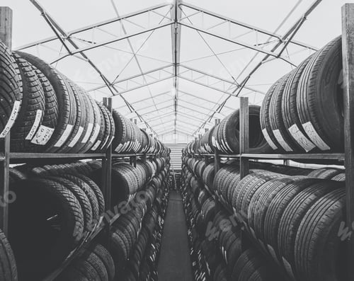 Preview: Warehouse full of car tires laid out on the shelves