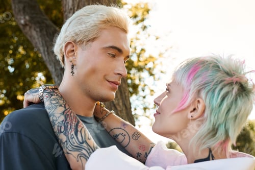 Preview: Young couple share a heartfelt moment in a sunlit park filled with joy and affection