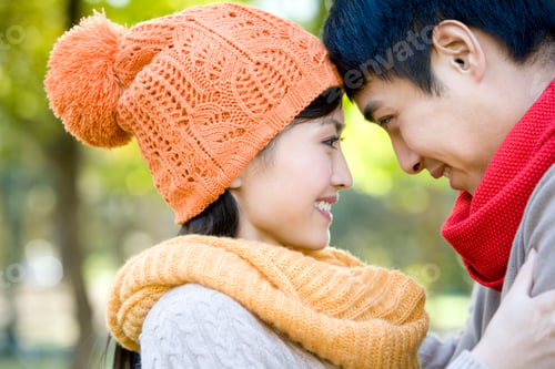 Preview: Young Couple in a Park in Autumn