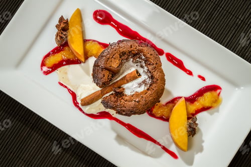 Preview: Muffin dessert adorned with peaches and cinnamon