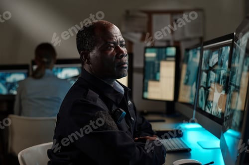 Preview: Security guard watching CCTV video