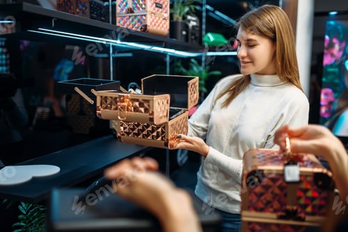 Preview: Consultant helps woman with choice in make-up shop