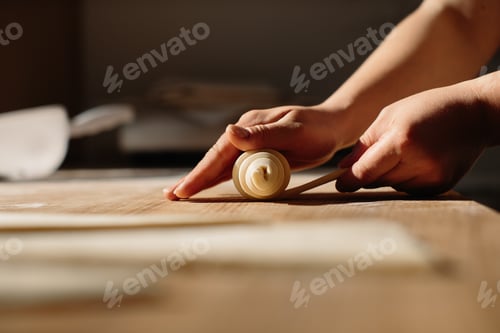 Preview: Female Hands Rolling Dough into Rolls, Baking Process Making Croissant.