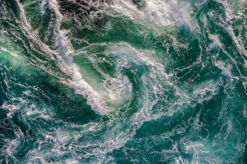Preview: Blue waves of water of the river and the sea meet each other during high tide and low tide.
