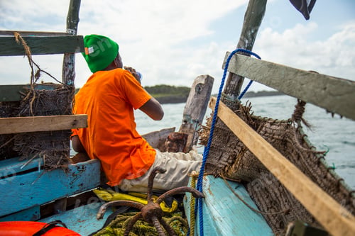 Preview: A local sailor in a boat on the island of Wasini. Kenya