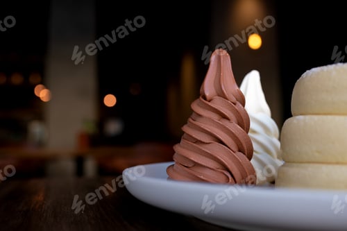 Preview: Close-up fluffy souffle pancakes with chocolate and vanilla ice cream