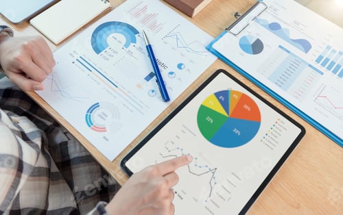 Preview: Businesswoman using a tablet to analysis graph company finance strategy statistics success concept