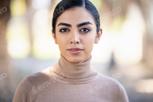 Preview: Portait of a beautiful young woman outdoors