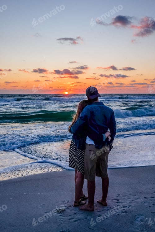 Preview: Couple Embracing at the Beach During Sunset