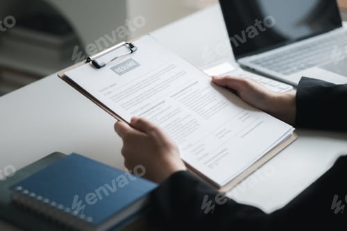 Preview: Person submitting resume to interview for a job with a company, Person attending a job interview wit