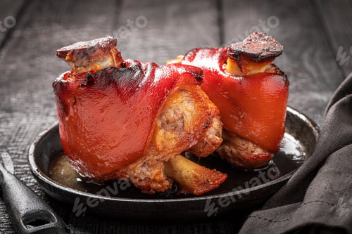 Preview: Roasted and fat pork knuckle1 with spices and garlic.