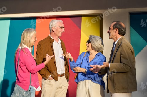 Preview: Senior friends talking and laughing together