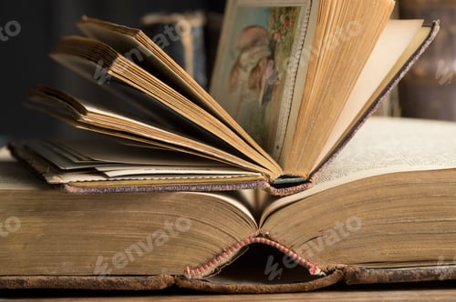 Preview: Two opened book in a historic library, close-up