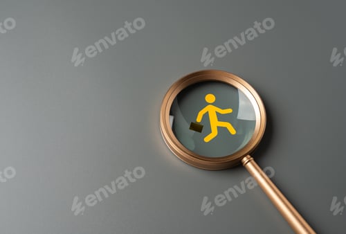 Preview: Magnifying glass and running man with briefcase in focus.