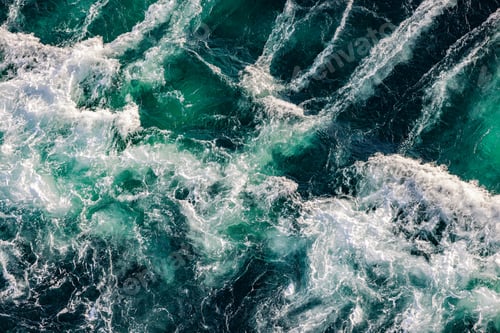 Preview: Blue waves of water of the river and the sea meet each other during high tide and low tide.