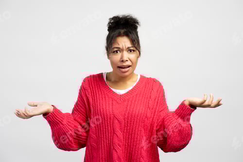 Preview: Confused Woman Shrugs Shoulders in Disbelief