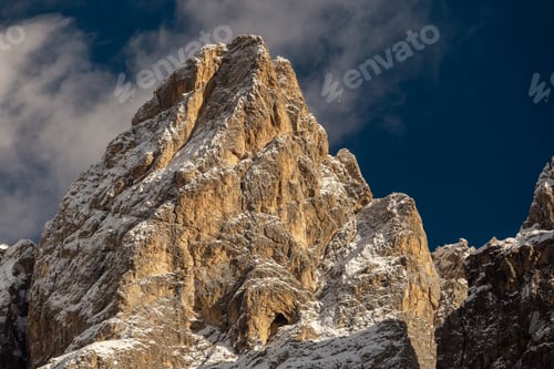 Preview: Landscape of the Dolomites covered in the snow under a blue cloudy sky in South Tyrol, Italy