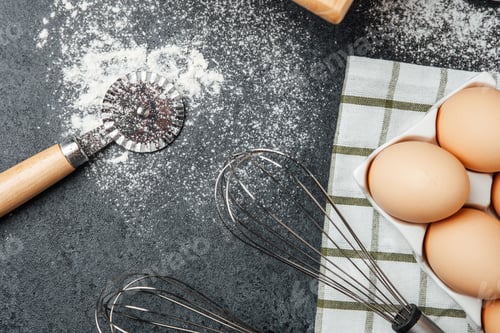 Preview: Preparing for baking with fresh ingredients and kitchen tools on the countertop