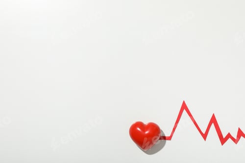 Preview: Heart with a cardiogram on a light background.