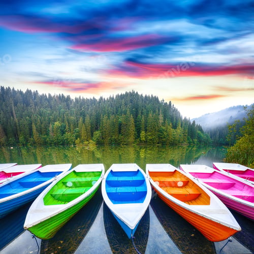 Preview: Boats on majestic mountain lake Lacul Rosu or Red Lake or Killer Lake