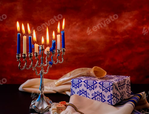 Preview: Jewish holiday Hanukkah creative background with menorah. View from above focus on .