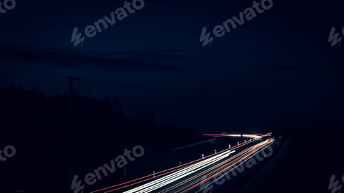 Preview: lights of moving cars at night. long exposure
