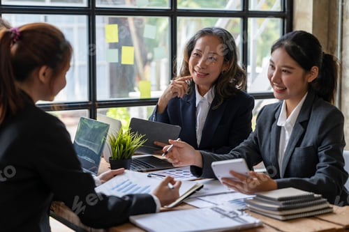 Preview: Business meeting concept brainstorming financial analyst financial report on graph document during c
