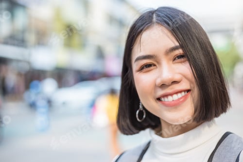 Preview: Self portrait with her smartphone. Closeup Asian beauty woman selfie indoor