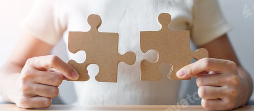 Preview: Hand connecting couple puzzle piece. Business Solving