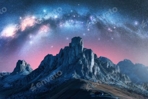 Preview: Milky Way over majestic alpine mountain range at starry night