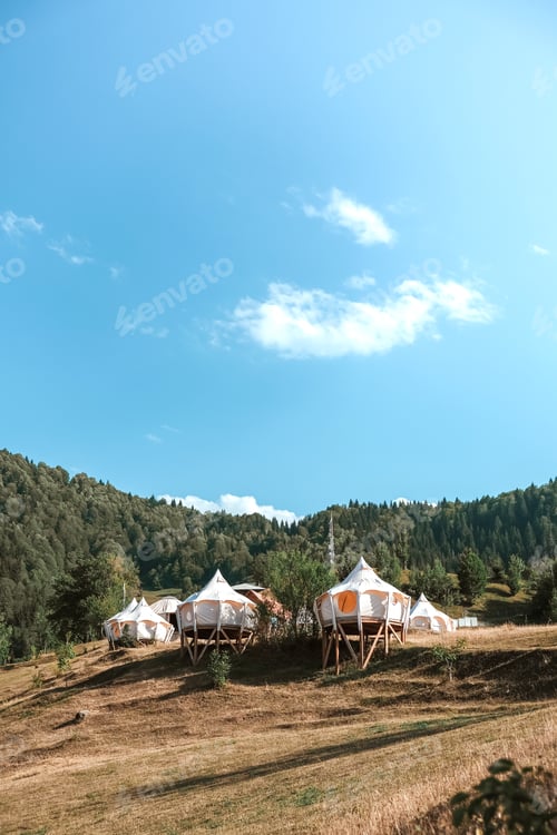 Preview: Travel.Tourist tent camping in the mountains Camping tent in the mountains in the summer in the wild