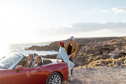 Preview: Lovely couple on the beach, traveling by car
