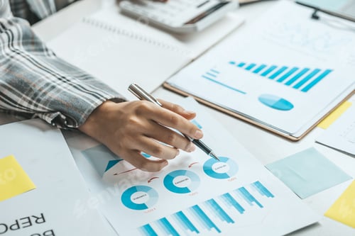 Preview: Business women are looking at the company's financial documents to analyze problems.