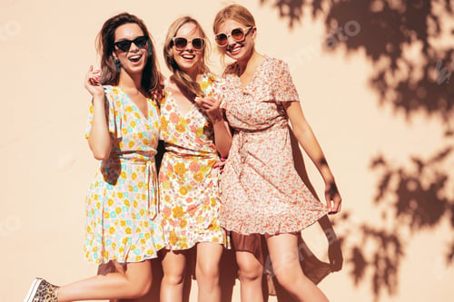 Preview: Three beautiful women posing outdoors