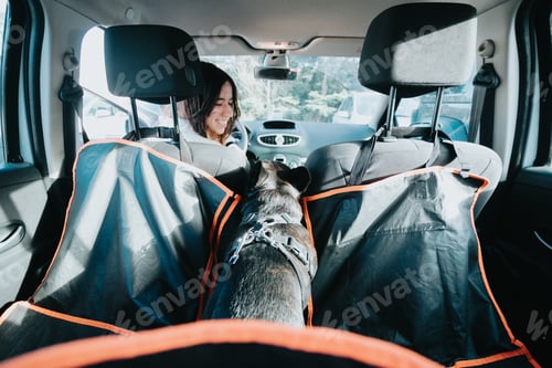 Preview: Young woman with her French bulldog arrive to the end of a excursion or trip with the rest of family