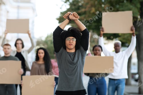 Preview: Young man activist leading international group of students
