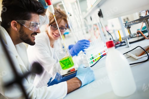 Preview: Young students of chemistry working in laboratory