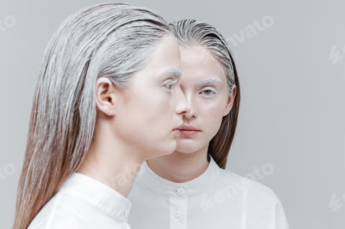 Preview: Close-up portrait of two women in smart white shirts