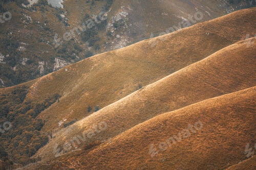 Preview: Golden rolling hills landscape