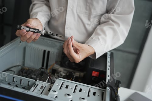 Preview: Computer Hardware dissemblers fixing computer PC.