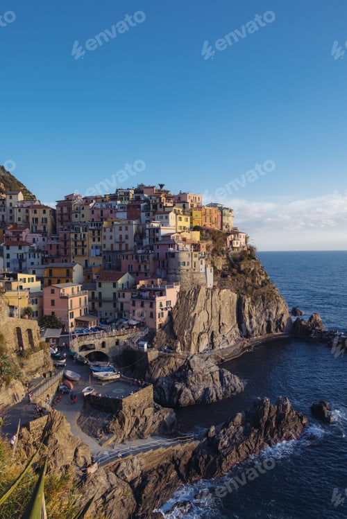 Preview: Rocky hills and colorful historic buildings of Manarola, Italy.